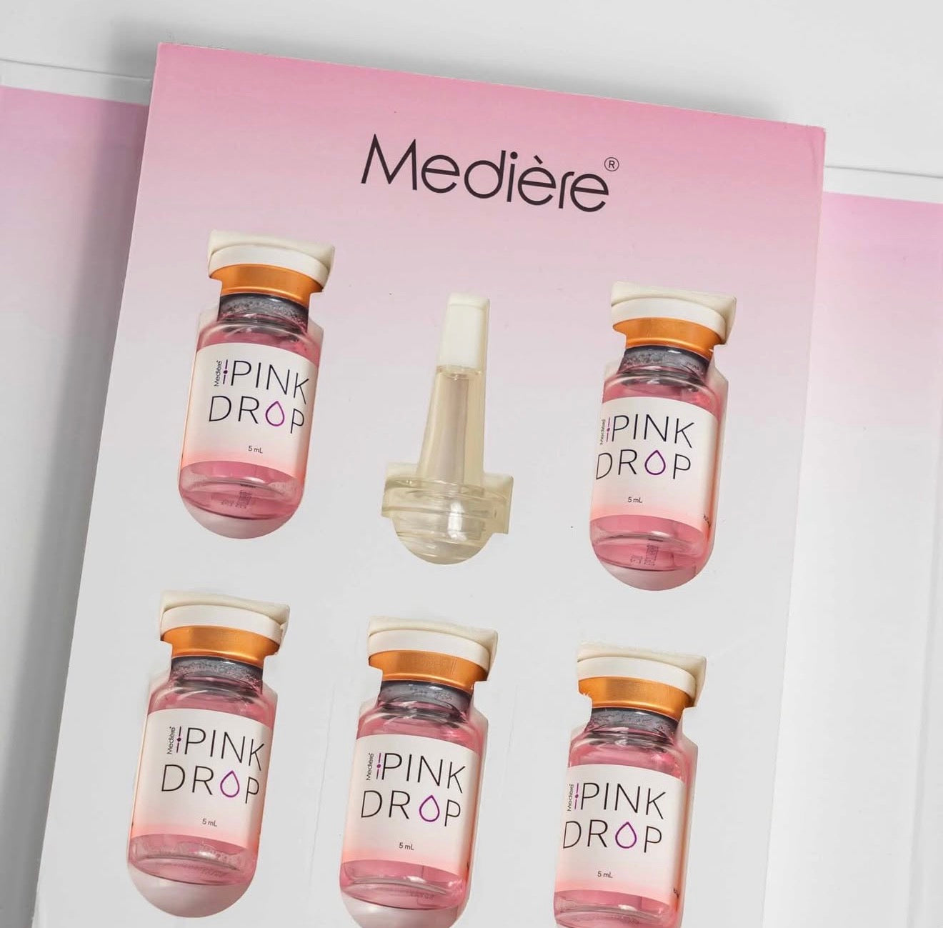 mediere pink drop skin booster product with 5 vials and applicator