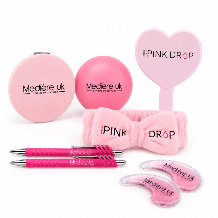 Collection of pink drop accessories with branding on a white background.