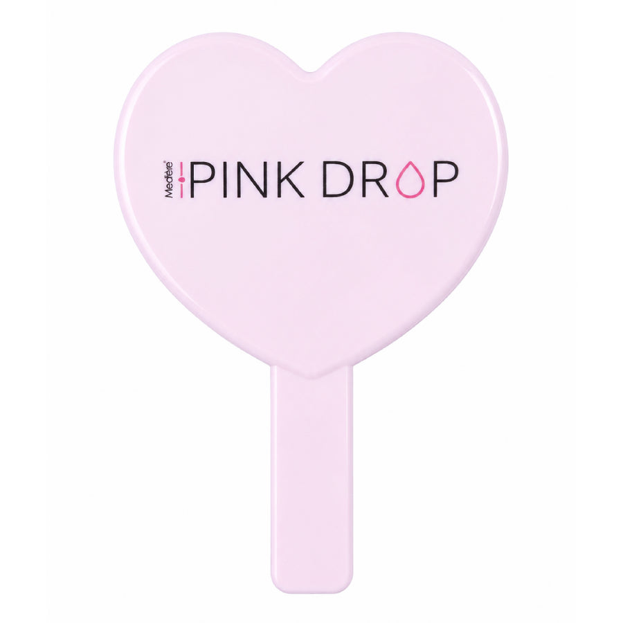 Heart-shaped pink mirror with 'Pink Drop' branding on a white background